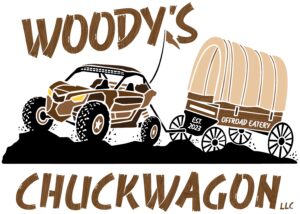 UTV climbing up a Rock pulling a wagon